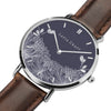 Minimalist Floral Chrysanthemum pattern Watch designed for women, it comes with silver case and brown genuine leather strap.